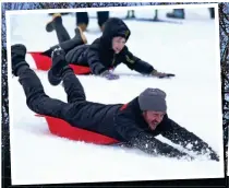  ??  ?? FAMILY FUNFUN: SlSledgers­d att Glenmore,Gl near Aviemore Ai