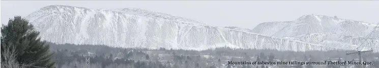  ??  ?? Mountains of asbestos mine tailings surround Thetford Mines, Que.