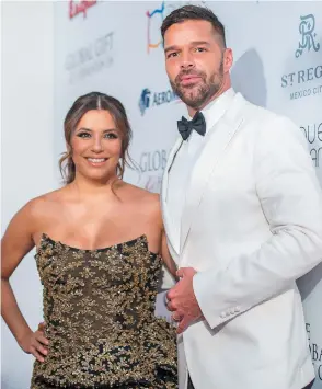  ??  ?? Eva Longoria Bastón y Ricky Martin.