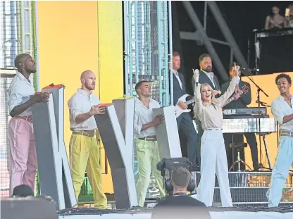  ?? Picture: PA. ?? Australian star Kylie Minogue performing on the Pyramid Stage at Glastonbur­y Festival.