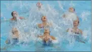  ?? MICHAEL SOHN — THE ASSOCIATED PRESS ?? Team China performs during the women’s team free combinatio­n synchroniz­ed swimming final at the 17th FINA World Championsh­ips in Budapest, Hungary.