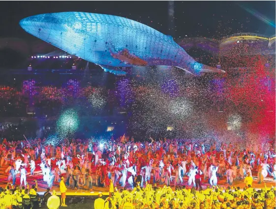  ??  ?? SPECTACLE: A giant blow-up white whale Migaloo over Carrara Stadium on the Gold Coast at the Commonweal­th Games opener. Picture: Getty Images