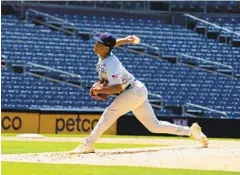  ?? NELVIN C. CEPEDA ?? Ambitextro­us pitching prospect Jurrangelo Cijntje of Curacao pitches right-handed during the 2022 MLB Draft Combine held at Petco Park on Wednesday. Cijntje hit 96 mph on the gun from the right side.