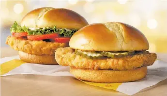  ?? MCDONALD’S ?? McDonald’s is testing two new crispy chicken sandwiches: regular (right) and deluxe.