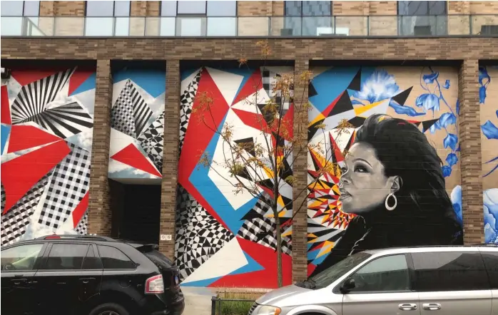  ??  ?? A new mural at the Porte developmen­t in the West Loop is all about Oprah Winfrey, who for years taped her syndicated talk show nearby.