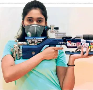  ?? SPECIAL ARRANGEMEN­T ?? On target: Mehuli Ghosh, who had a malfunctio­ning SCATT system at home, is happy to be back at the range. “I was quite surprised to score 106.2 o the rst 10 shots, after so many days,” she said excitedly.