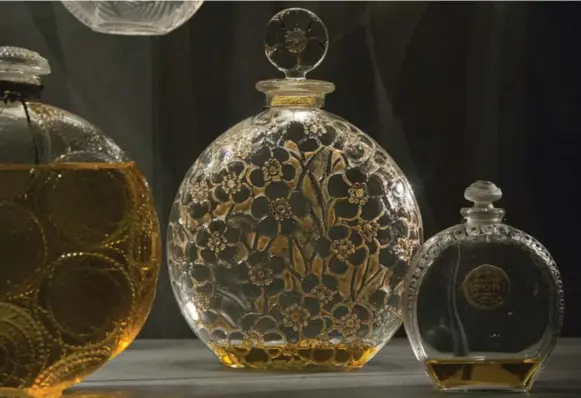  ?? MICHEL EULER PHOTOS/THE ASSOCIATED PRESS ?? A “Clamart” perfume bottle, designed by René Lalique in 1926, is one of the many exotic, ostentatio­us vials on display at the Fragonard perfume museum in Paris.