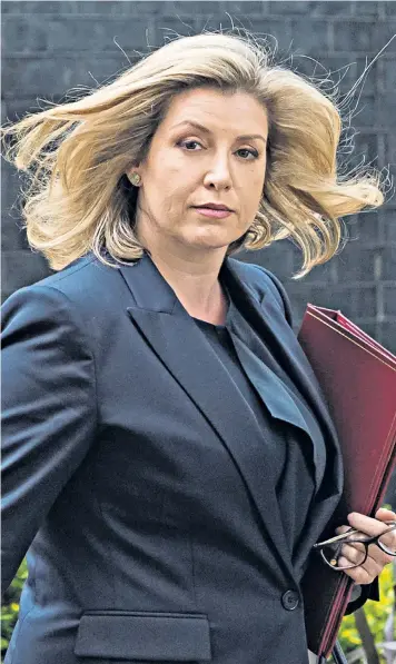  ?? ?? Trade minister Penny Mordaunt is touted as a Conservati­ve leader who could unite the Left and Right of the party