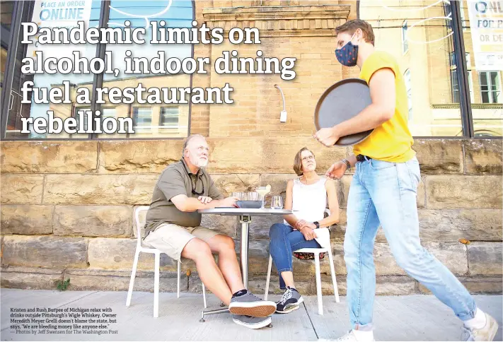  ?? — Photos by Jeff Swensen for The Washington Post ?? Kristen and Rush Burpee of Michigan relax with drinks outside Pi sburgh’s Wigle Whiskey. Owner Meredith Meyer Grelli doesn’t blame the state, but says, “We are bleeding money like anyone else.”