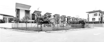  ??  ?? Sensesasi Residensi project built at Kampung Padang Balang under Malay Land Reserve. - Bernama photo
