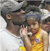  ?? STEPHEN M. DOWELL/ORLANDO SENTINEL VIA AP ?? Kobe Bryant and daughter Gianna in 2009.
