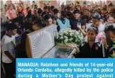  ?? AFP ?? MANAGUA: Relatives and friends of 14-year-old Orlando Cordoba, allegedly killed by the police during a Mother’s Day protest against Nicaraguan President Daniel Ortega, attend his wake on Friday. —