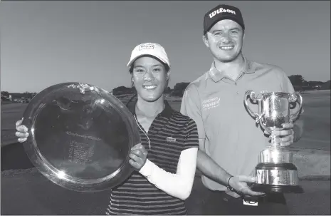  ?? Photo: VCG ?? Celine Boutier of France and David Law of Scotland pose with their winners’ trophies during Day 4 of the Vic Open at 13th Beach Golf Links in Barwon Heads, Victoria, Australia on Sunday.