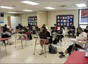  ?? SUBMITTED PHOTO ?? Students take to the books in a West Chester classroom. West Chester Area School District will receive $4.2million in COVID-19 relief funding to help fully reopen all schools.