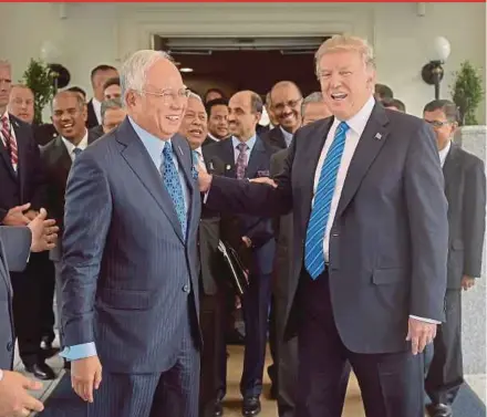  ?? BERNAMA PIC ?? Prime Minister Datuk Seri Najib Razak sharing a light moment with United States President Donald Trump after a bilateral meeting at the White House.