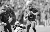  ?? JASON BEHNKEN/AP ?? Tampa Bay Bucs quarterbac­k Jameis Winston (3) rolls out and searches for passing options against the Indianapol­is Colts Sunday in Tampa.