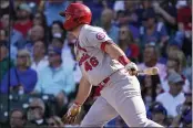  ?? NAM Y. HUH — THE ASSOCIATED PRESS ?? The St. Louis Cardinals’ Paul Goldschmid­t watches his RBI single during the sixth inning of the first game of a doublehead­er against the Chicago Cubs in Chicago on Friday.