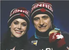  ?? Charlie Riedel / the Cana dian press files ?? Figure skating stars Tessa Virtue and Scott Moir with their gold medals at the 2018 Winter Olympics.