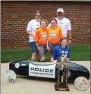  ?? SUBMITTED PHOTO ?? Elizabeth Maxwell, in blue shirt, with her winning Super Stock car. Behind her, back row, are parents Laura and Mike, and sisters Julia, left, and Samantha.