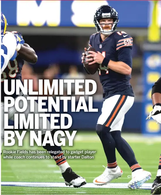  ?? KYUSUNG GONG/AP ?? Coach Matt Nagy is committed to Andy Dalton as his starting quarterbac­k for now, with backup Justin Fields appearing only in a cameo role.
