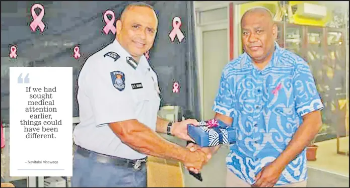  ?? Picture: SUPPLIED ?? Navitalai Visawaqa (right) receives a gift from Police Commission­er Brigadier General Sitiveni Qiliho during the Fiji Police Force’s Pinktober morning tea last week.