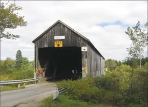  ?? Canadian Press photo ?? McGuire Bridge, seen in Elmsville, N.B., in an undated handout photo, is one of two covered bridges which are closed as a result of flood damage.