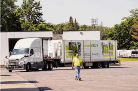  ?? Courtesy Cindy Schultz Photograph­y ?? During an Aug. 22 event, the Regional Food Bank of Northeaste­rn New York welcomed its new “freight” farm by truck, which it installed at its Latham distributi­on center.