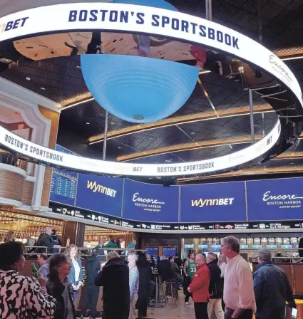  ?? Mass. STEVEN SENNE/AP ?? A total of 33 states and the District of Columbia now offer at least some form of sports wagering – each scrambling for shares of a multibilli­on-dollar enterprise. This is the Encore Boston Harbor casino in Everett,