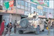  ??  ?? Afghan special forces patrol the streets of Herat in Afghanista­n as the Taliban continue a series of offensives in urban areas.