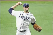  ?? Chris O'Meara / Associated Press ?? Rays pitcher Charlie Morton delivers to the Red Sox during the first inning of Tuesday’s game in
St. Petersburg, Fla.