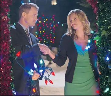  ?? CTV 2 ?? Natasha Henstridge stars with Gabe Hogan in Christmas Song, a family-friendly drama airing Wednesday.