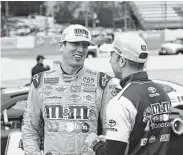  ?? Steve Helber / Associated Press ?? Kyle Busch, left, will lead the pack to start today’s NASCAR Monster Energy Cup playoff race at Martinsvil­le, Va.