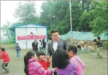  ?? PHOTOS PROVIDED TO CHINA DAILY ?? Duan Xiaopeng helps more than 1,000 bereaved parents and over 200 of them are part of the art troupe he establishe­d in 2015 where activities like a spring outing, birthday parties and classes like tai chi and dancing are held.