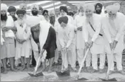  ?? HT PHOTO ?? SGPC chief Kirpal Singh Badungar (third from right) with others, laying foundation stone of ‘chhabeel’ stalls on approach road to Golden Temple in Amritsar on Friday.