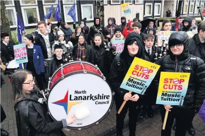  ??  ?? Banding together Young musicians protested outside Motherwell Civic Centre on Monday