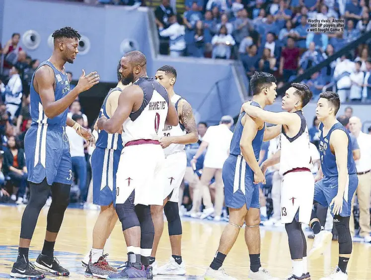  ?? STAR photos by JOEY MENDOZA ?? Worthy rivals: Ateneo and UP players after a well-fought Game 1.