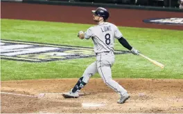  ?? PHOTO: USA TODAY SPORTS ?? Out of there . . . Tampa Bay Rays second baseman Brandon Lowe watches after connecting for a tworun homer in the fifth inning of the second game of the World Series against the Los Angeles Dodgers in in Arlington, Texas, yesterday.