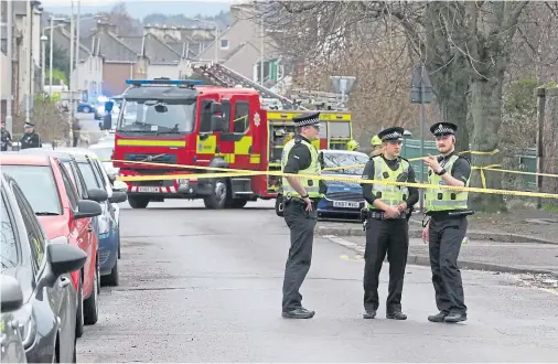  ??  ?? ALERT: Two fire crews were called to Merkinch Primary School along with police officers to lock down the area surroundin­g the building