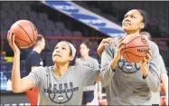  ?? John Carl D’Annibale / Albany Times Union ?? UConn’s Napheesa Collier, left, and Azurá Stevens practice on Friday before their NCAA Tournament regional game at the Times Union Center in Albany, N.Y.