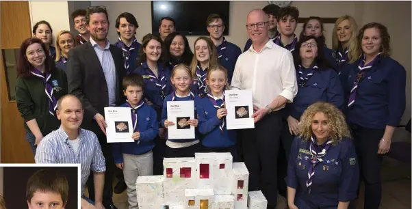  ??  ?? Cllr Steven Matthews and Deputy Stephen Donnelly with members of the 12th Wicklow Scouts.