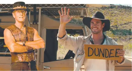  ?? Picture: SCREEN AUSTRALIA ?? A publicity shot shows Chris Hemsworth as Wally Jr and, left, the original Crocodile Dundee, Paul Hogan.