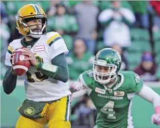  ?? MARK TAYLOR/CP FILES ?? Roughrider­s linebacker Cameron Judge prepares to lower the boom on Eskimos quarterbac­k Mike Reilly during CFL action last season. The CFL is considerin­g new rules that better protect passers.