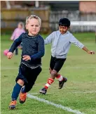  ??  ?? Arlo Turner, 5, is ready to kick off his football career on Saturday morning.