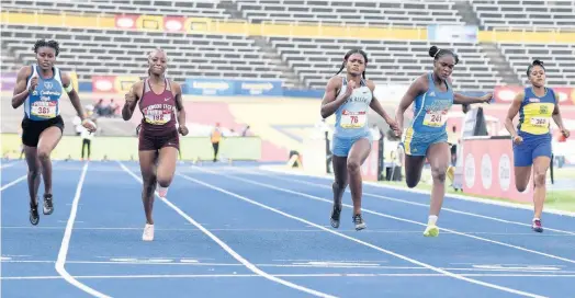  ??  ?? Edwin Allen’s Brandy Hall ( centre) takes the Class One Girls 100m final ahead of Hydel High School’s Shenese Walker ( second right), Holmwood Technical High School’s Sasheika Steele ( second left), St Catherine High School’s Shakeira Bowra ( left), and Rusea’s High School’s Salieci Myles.