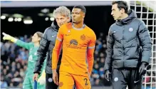  ?? Reuters ?? INTER Milan’s Denzel Dumfries is substitute­d after sustaining an injury and is one of the key figures missing for the Serie A leaders. |