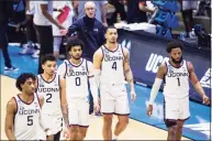  ?? Robert Franklin / Associated Press ?? UConn players take to the court after a timeout late in the second half against Maryland on Saturday.