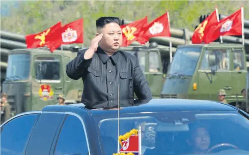  ??  ?? An undated KCNA photo released on Wednesday shows North Korean leader Kim Jong-un attending a combined fire demonstrat­ion of the Korean People’s Army.