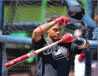  ?? Associated Press ?? In the cage: Atlanta Braves outfielder Cristian Pache takes batting practice during baseball spring training at CoolToday Park Wednesday in North Port, Fla.