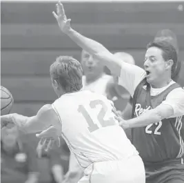  ?? MIKE STOCKER/STAFF PHOTOGRAPH­ER ?? Rick Pitino, right, plays some defense for his Red Birds team as he pressures Jeff Ebner in the 55-over game Tuesday in Coral Springs.