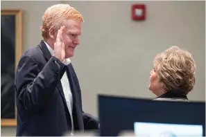  ?? The Associated Press ?? ■ Alex Murdaugh swears to tell the truth before he takes the stand during his trial for murder Thursday at the Colleton County Courthouse in Walterboro, S.C.